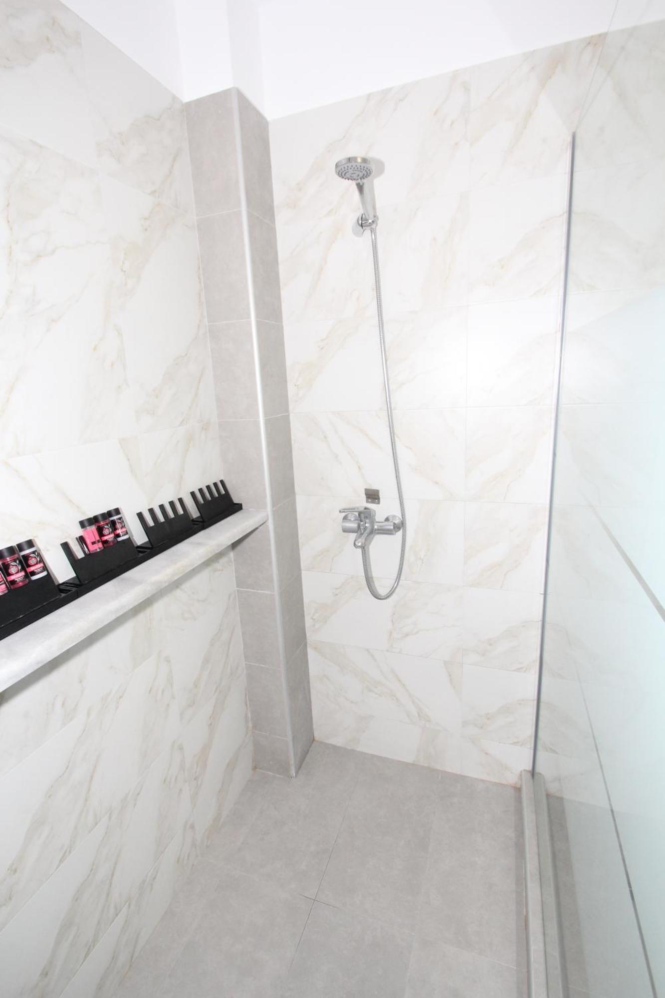 Filoxenia Apartment อาร์เตมีดา ภายนอก รูปภาพ